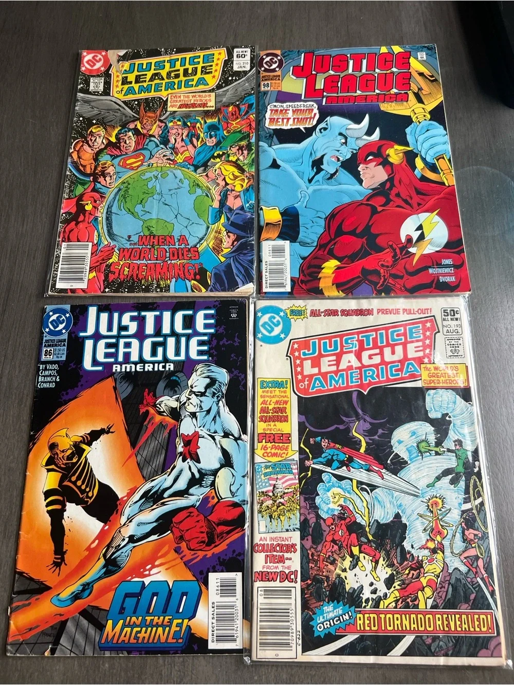 DC Comics Justice League of America Comic Covers - Red, Blue, Black, Yellow